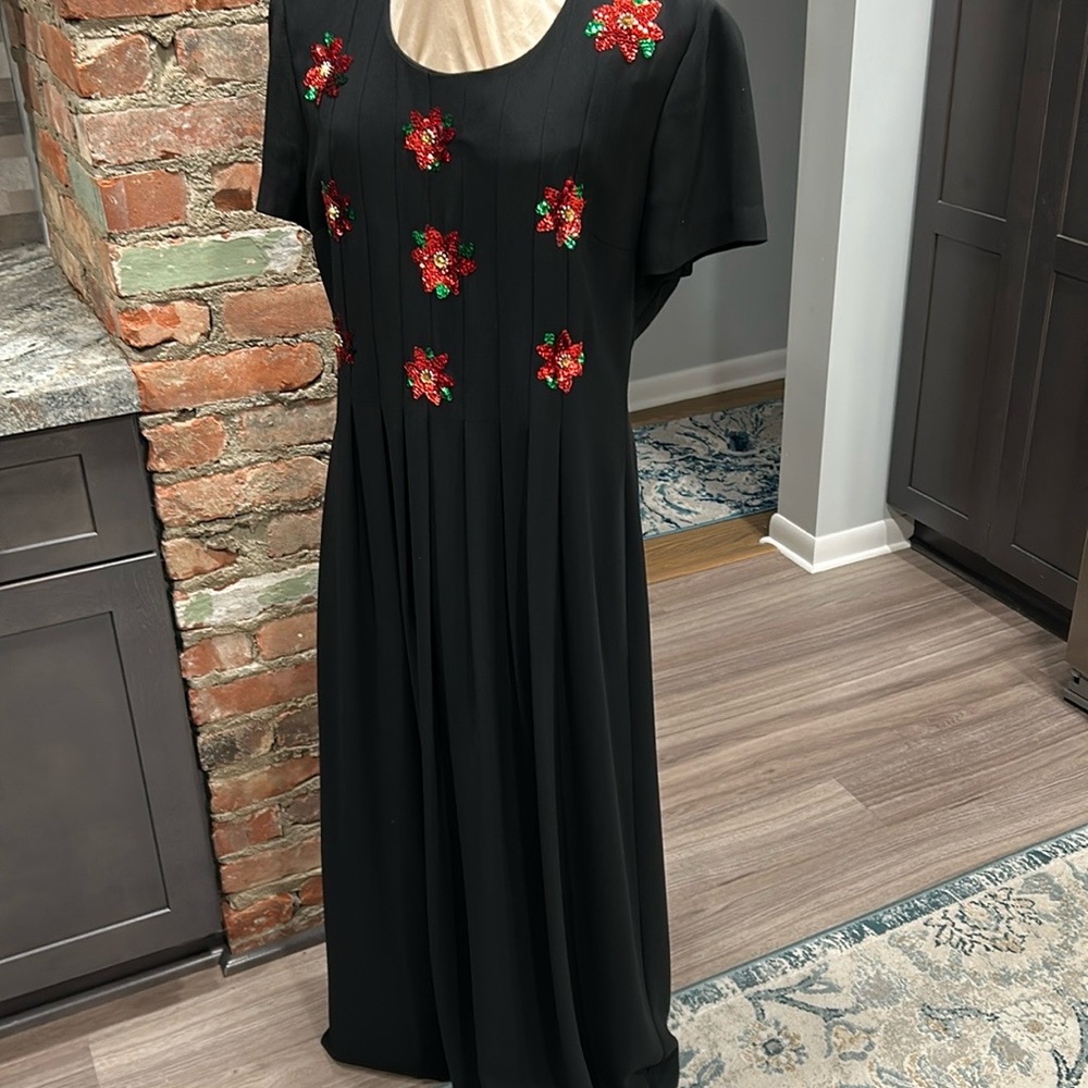 Elegant Holiday Black Dress emblazoned with Red sequined poinsettia